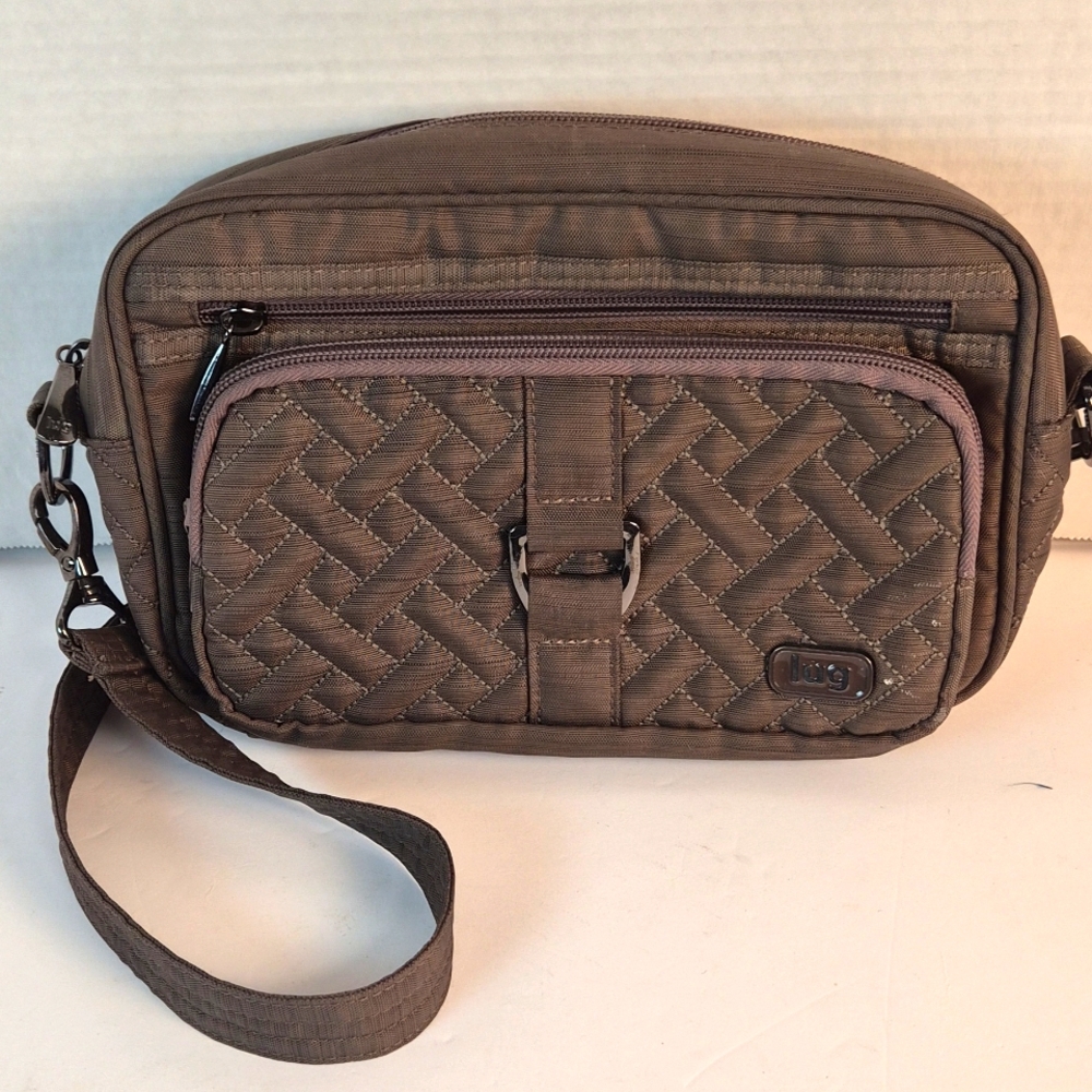 Lug Carousel- convertible cross body bag- tan